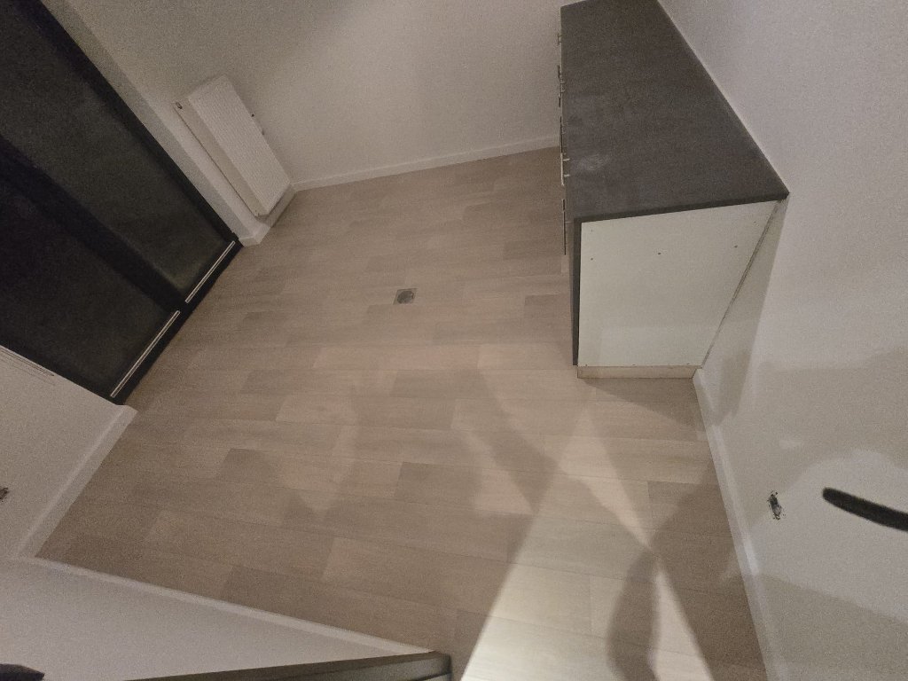 Na renovatie: nieuwe laminaatvloer leefruimte Turnhout
